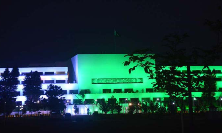 Islamabad: Parliament Illuminated in Green to Commemorate 50 Years of Ahmadis Declared Non-Muslims.