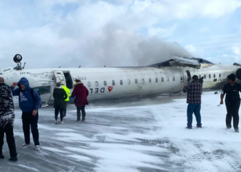 All passengers survive as plane overturns in crash landing at Toronto airport