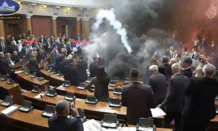 Serbian opposition lawmakers disrupt parliament with smoke bombs and flares