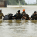 Dozens of villages cut off after deadly floods in India