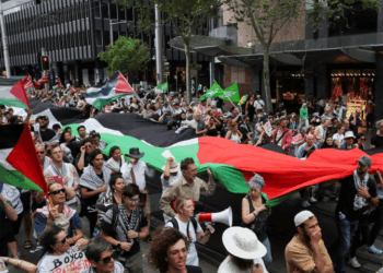 Tens of thousands rally in Sydney, London, other cities in support of Palestinians amid fragile Gaza ceasefire