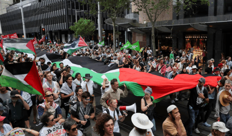 Tens of thousands rally in Sydney, London, other cities in support of Palestinians amid fragile Gaza ceasefire
