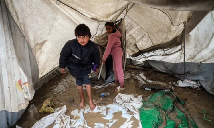 Israeli strikes continue across Gaza amid alleged ceasefire violations as winter rains deepen humanitarian crisis