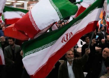 Iran says trader protests contained after government talks, situation normalised