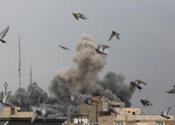 Iran launches missile barrage on US bases and Israeli cities; fire erupts at US Embassy in Riyadh