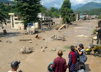 Deadly floods kill at least 19 in Nepal as hundreds of tourists remain missing