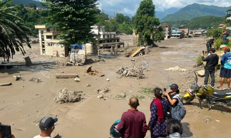 Deadly floods kill at least 19 in Nepal as hundreds of tourists remain missing