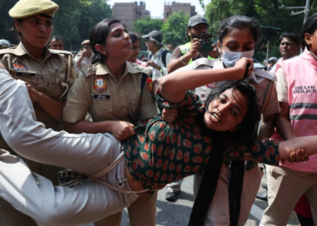 Indian police detain protesters amid lockdown over voter list revision