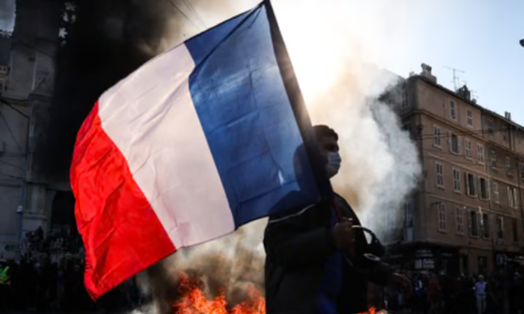 France considers partial curfews after weekend of riots and looting